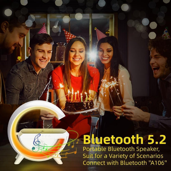 People celebrating a birthday with a cake and sparklers, featuring a Bluetooth speaker advertisement.